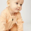 langaermetsovedragt01_coral langærmet heldragt på baby